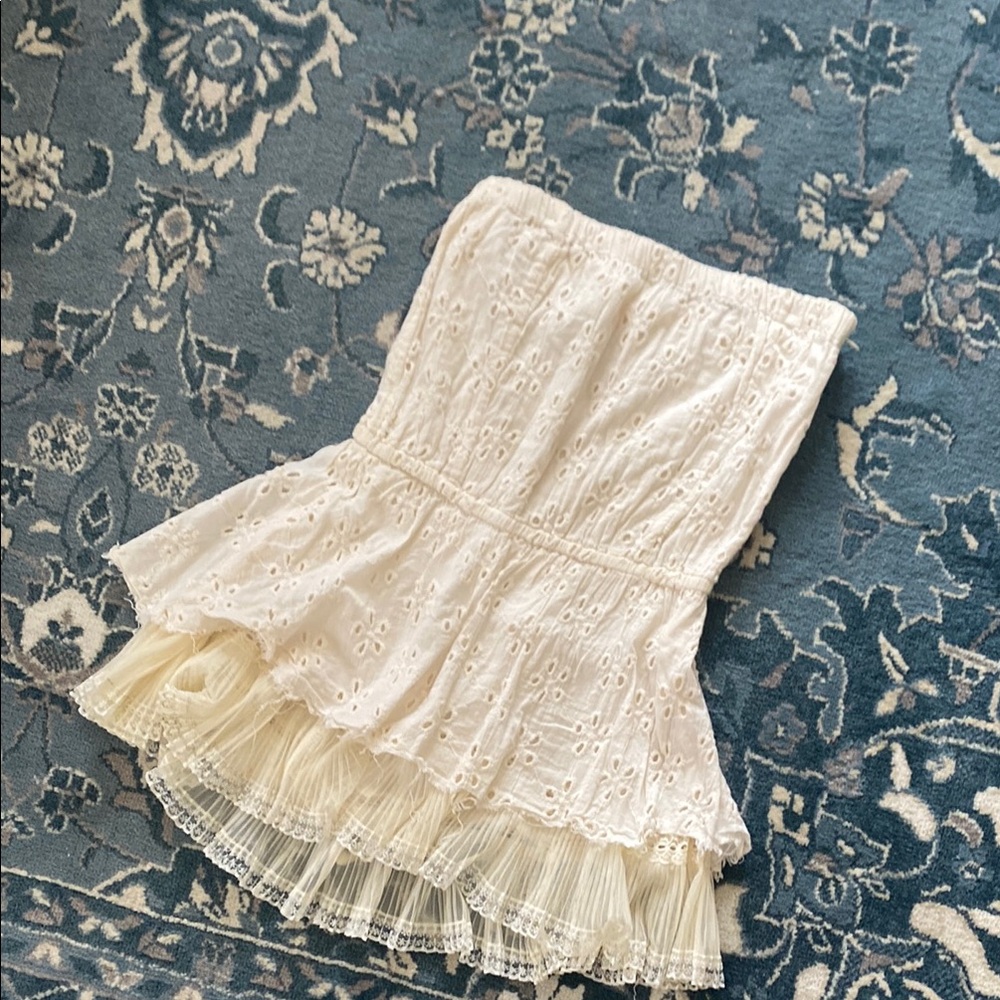 White Eyelet Strapless Top with Pleated Hem